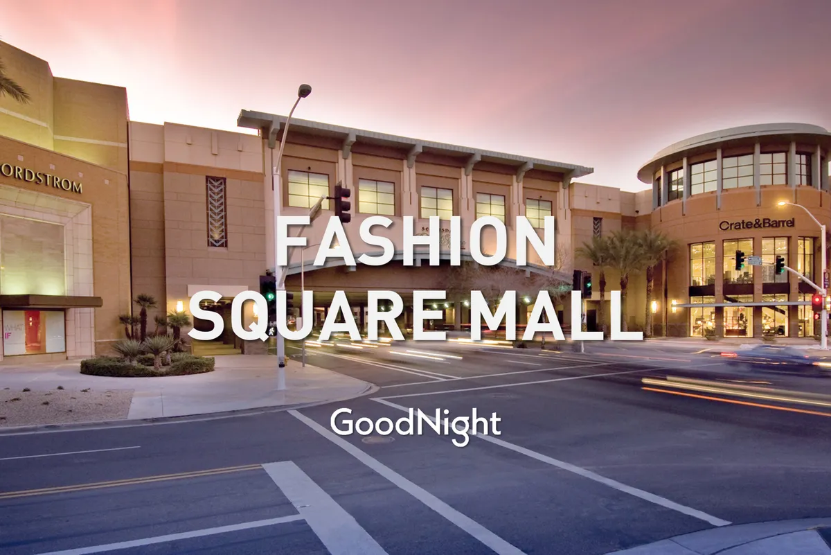 This image showcases the upscale storefronts of Nordstrom and Crate & Barrel at the Fashion Square Mall, framed by palm trees and a pedestrian walkway. The environment is stylish and active, emphasizing shopping and daytime exploration.